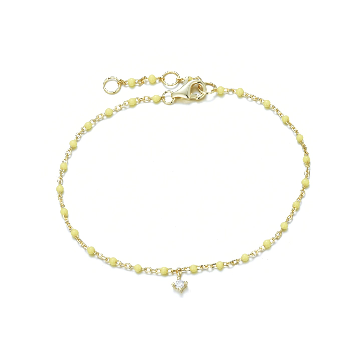 Gold-plated chain bracelet with yellow enamel beads and hanging cubic zirconia charm.
