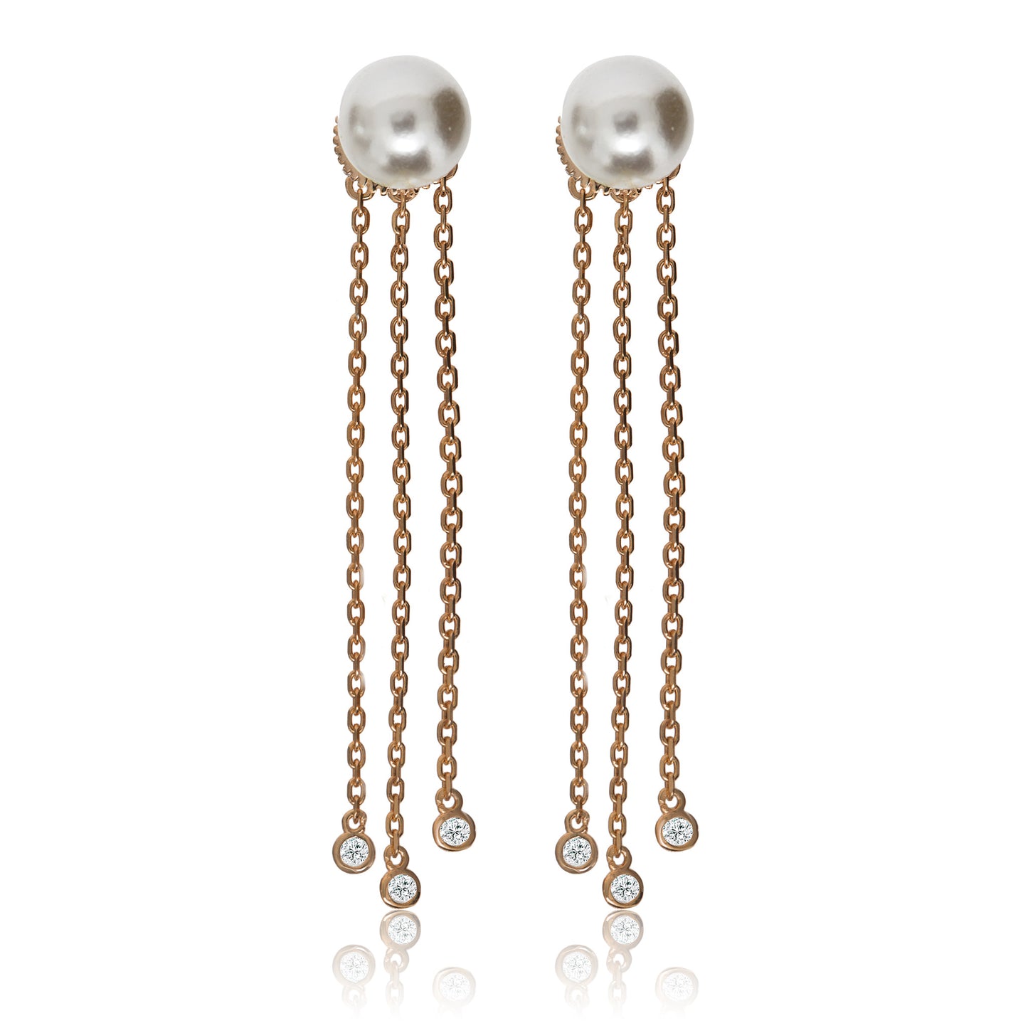 Rose gold on silver pearl stud earrings with three hanging chains, each featuring a small cubic zirconia gemstone at the end.