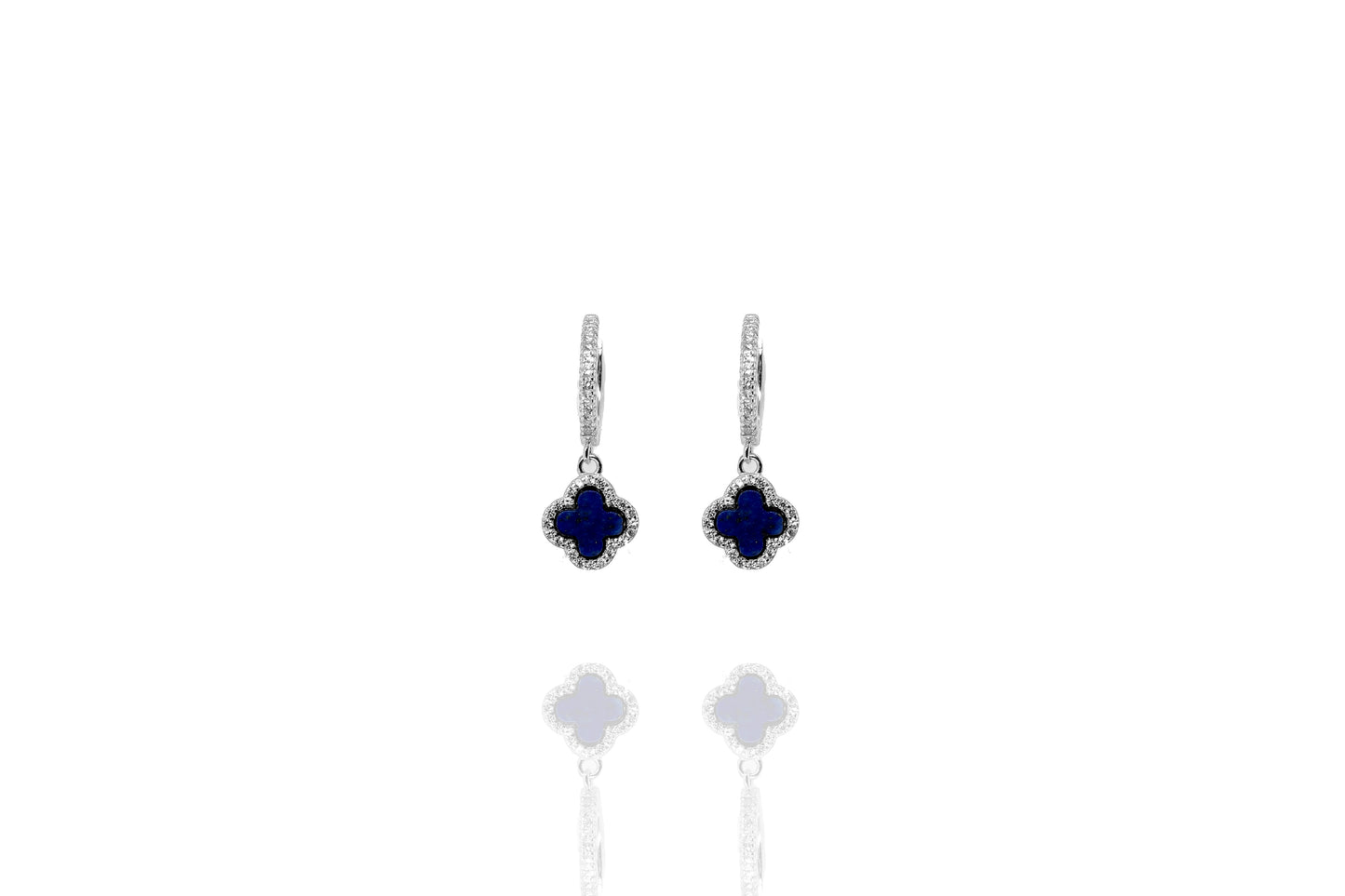 Sterling Silver Lapis Clover Earrings with white cubic zirconia rim on a reflective surface.