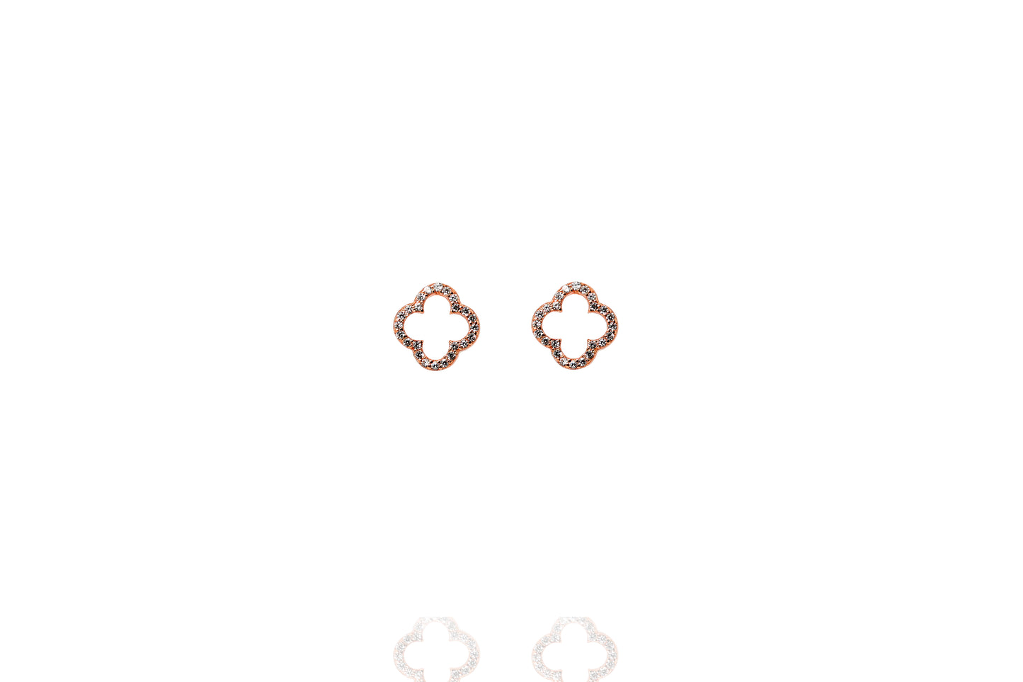 Rose gold plated hollow clover earrings rimmed with cubic zirconia stones .