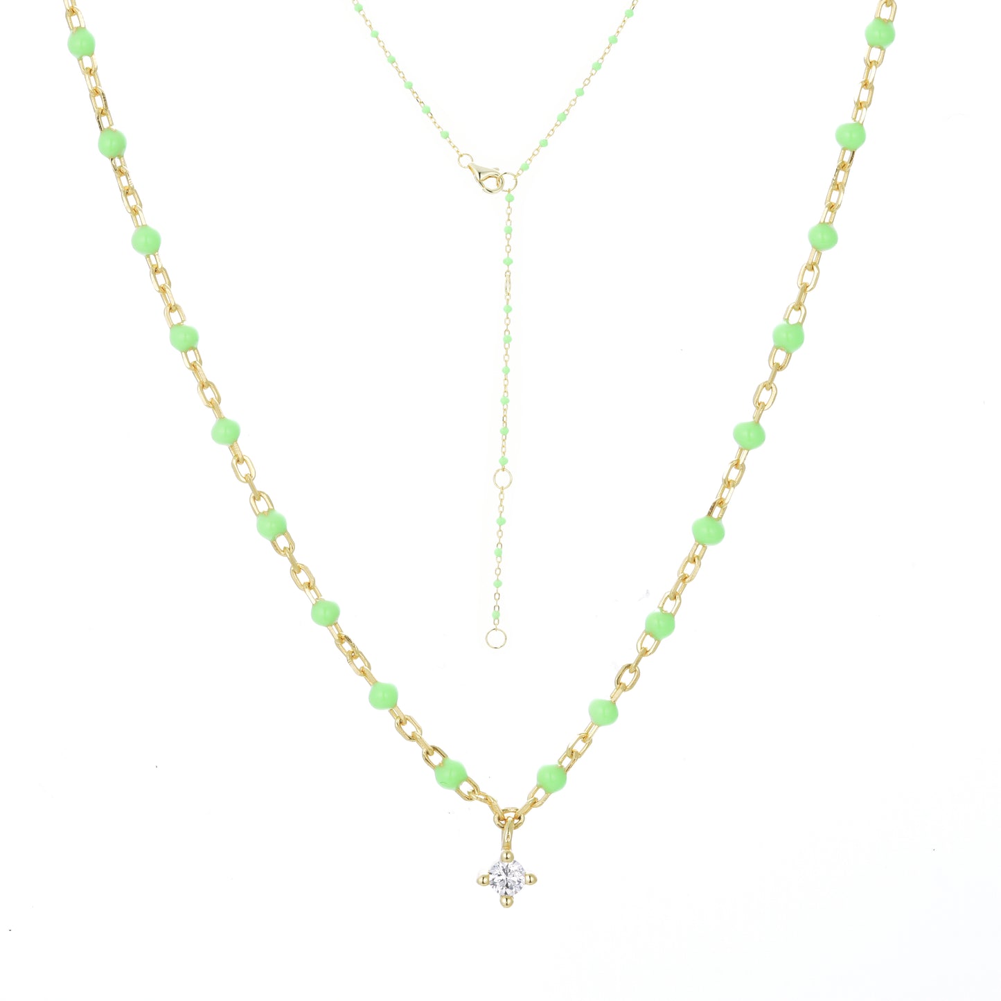 Gold plated on silver chain necklace with apple green enamel beads and a hanging cubic zirconia pendant.