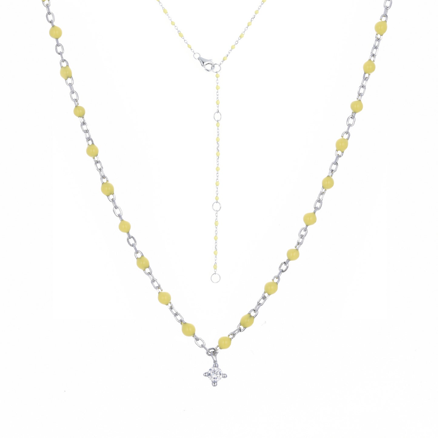 Gold plated on silver necklace with yellow enamel beads and hanging cubic zirconia pendant.