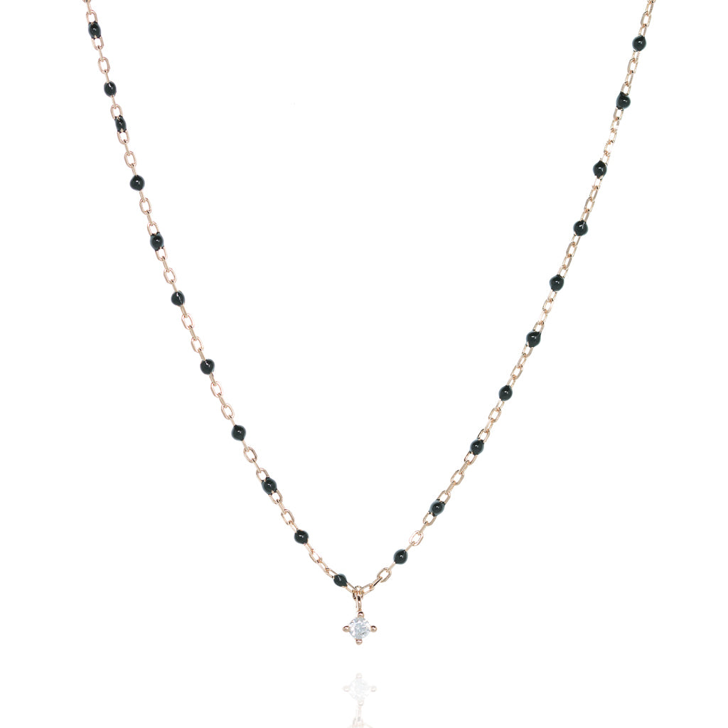 Elegant rose gold plated silver necklace with black beads and central sparkling Cubic Zirconia.