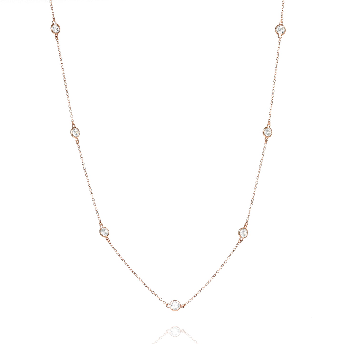 Rose gold plated long chain necklace with bezel set cubic zirconia, 100 cm length.