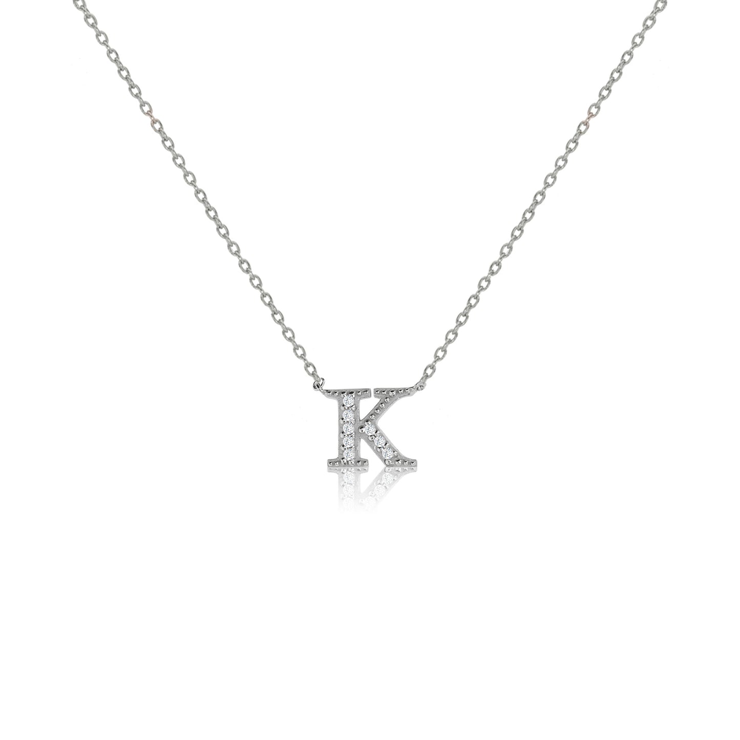 Sterling silver initial necklace with cubic zirconia decoration and micron plating, featuring a sliding length adjuster, depicting the letter 'K'