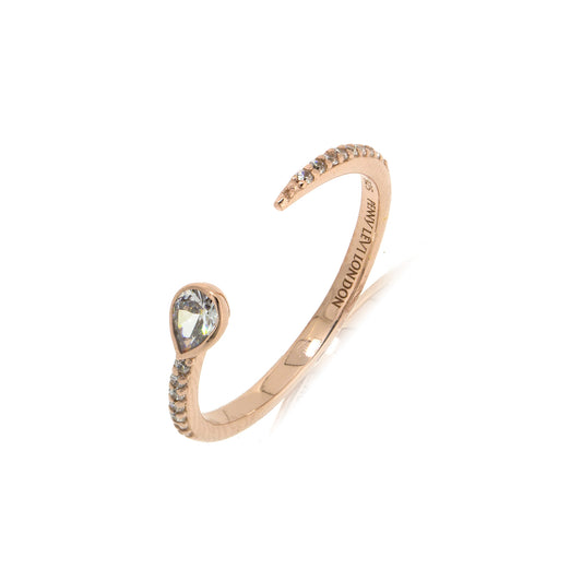 
Gold-plated open claw ring with large Cubic Zirconia on one side and small

