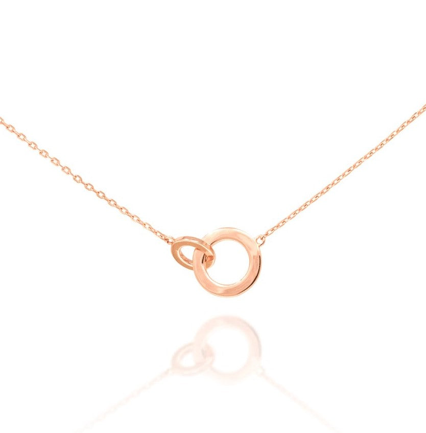 
Rose gold plated on silver intertwined circle necklace with an adjustable chain and lobster clasp.


