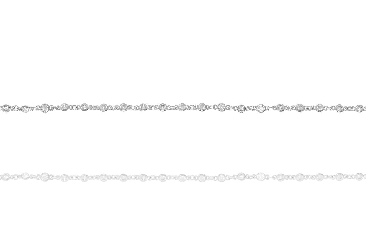
Sterling silver bracelet with bezel cut cubic zirconia stones.

