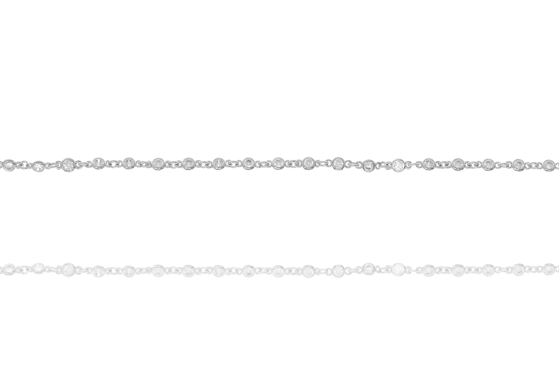 
Sterling silver bracelet with bezel cut cubic zirconia stones.

