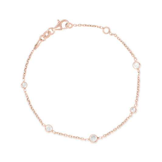 
Rose gold and silver chain bracelet with five bezel set Cubic Zirconia stones and lobster clasp.

