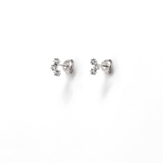 
Sterling silver stud earrings with a 3 cubic zirconia cluster, displayed  .

