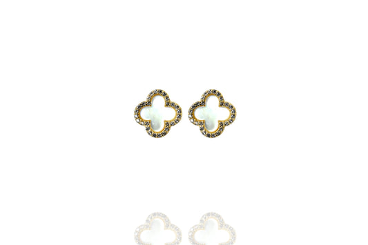 
Gold-plated silver Mother of Pearl clover stud earrings with cubic zirconia rim.

