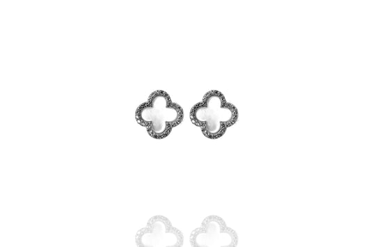 
Pair of sterling silver clover stud earrings rimmed with cubic zirconia, 12mm diameter.

