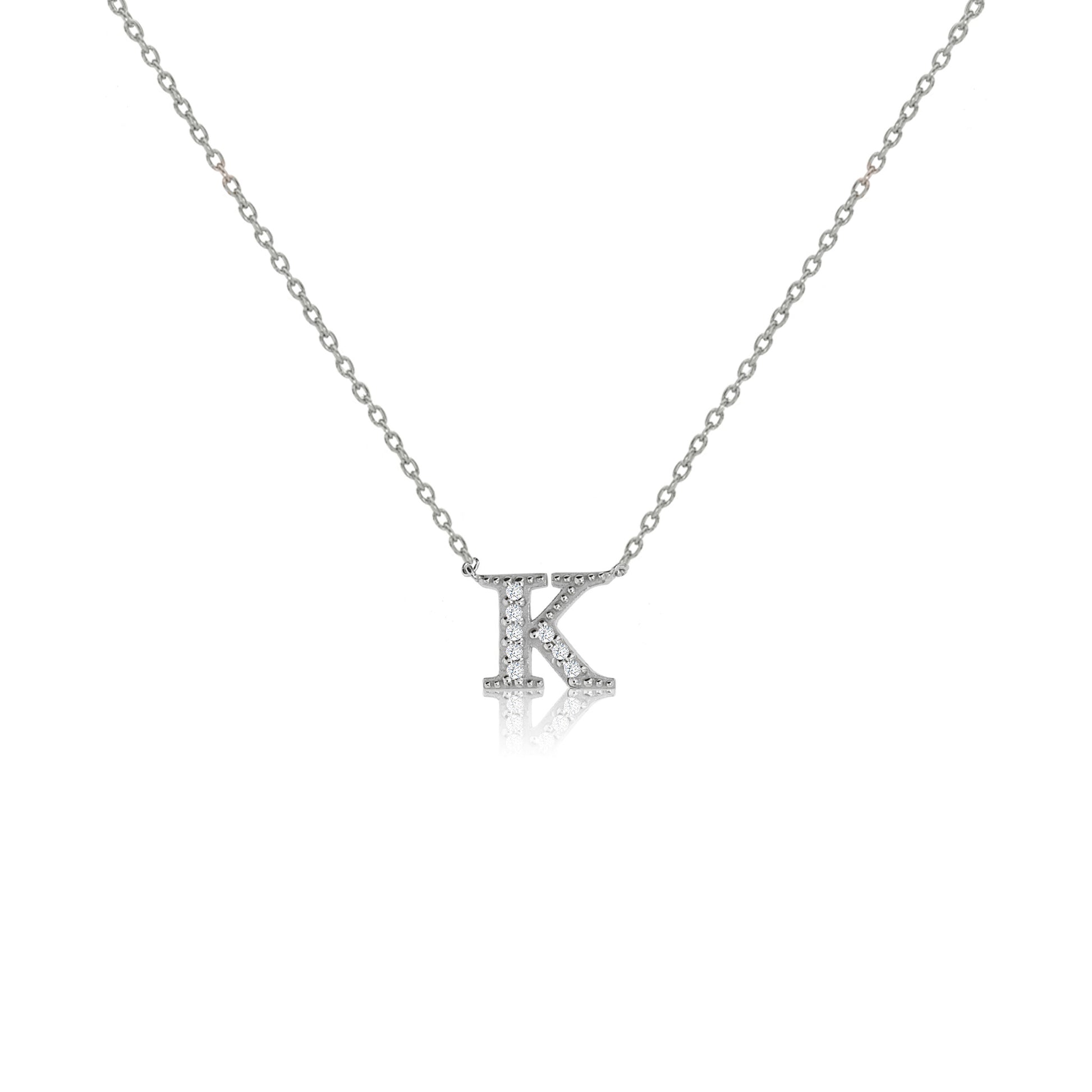
Sterling silver initial necklace with cubic zirconia decoration and micron plating, featuring a sliding length adjuster, depicting the letter 'K'

