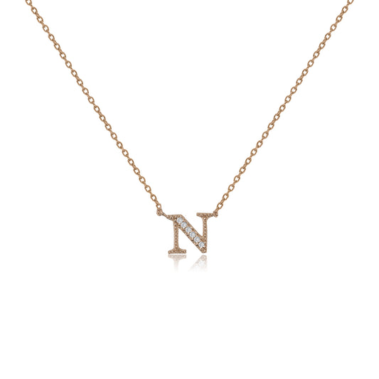 
Rose gold plated initial 'N' necklace with cubic zirconia decoration  .

