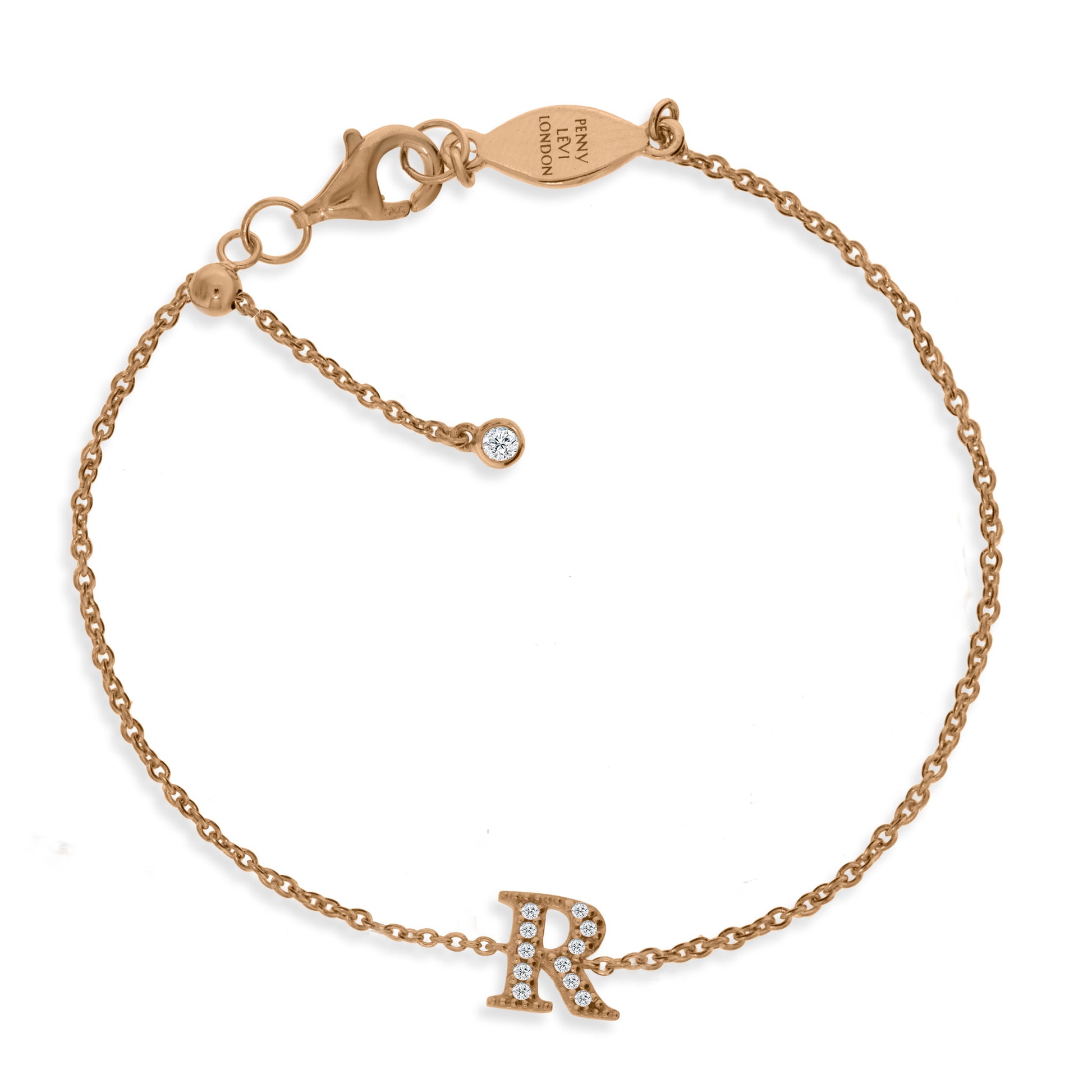 
Rose gold plated initial bracelet on a silver chain with cubic zirconia stones and an adjustable sliding size adapter.

