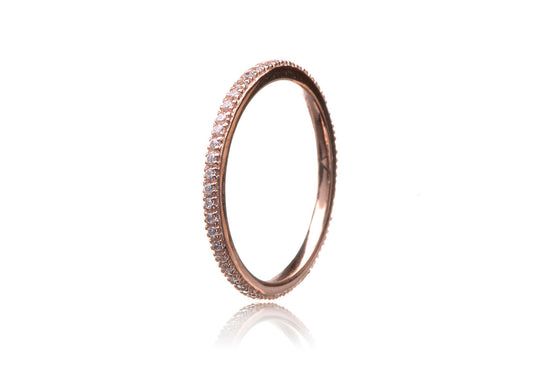 
Narrow pave stacking ring in sterling silver with Cubic Zirconia stones.

