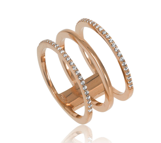 
Gold-plated open claw ring with large Cubic Zirconia on one side and small

