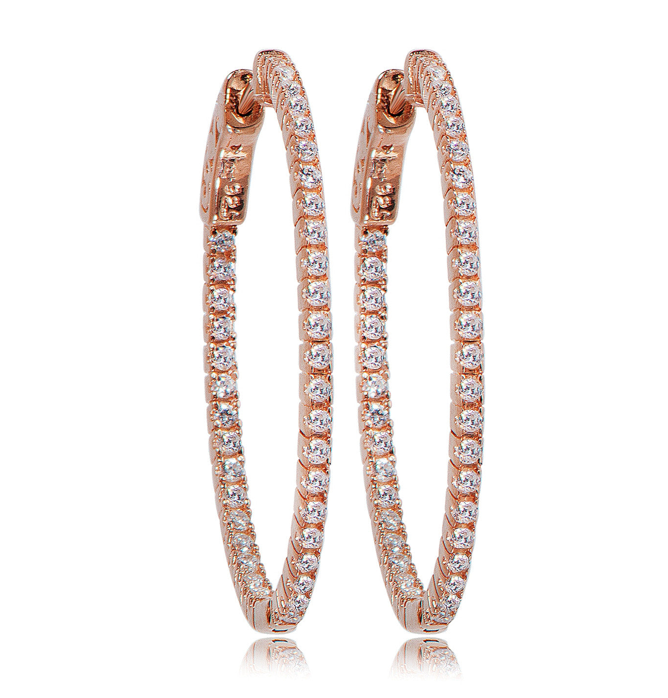 
Rose gold plated silver hoop earrings with cubic zirconia detailing and special safety lock, length 4.80 cm, width 4 cm.

