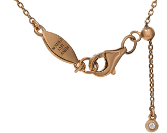 
Close-up of a rose gold plated silver initial bracelet with a sliding size adapter and Cubic Zirconia (CZ) stones.

