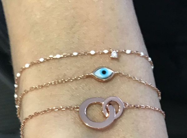 
Rose gold plated silver chain bracelet with white beads and hanging cubic zirconia

